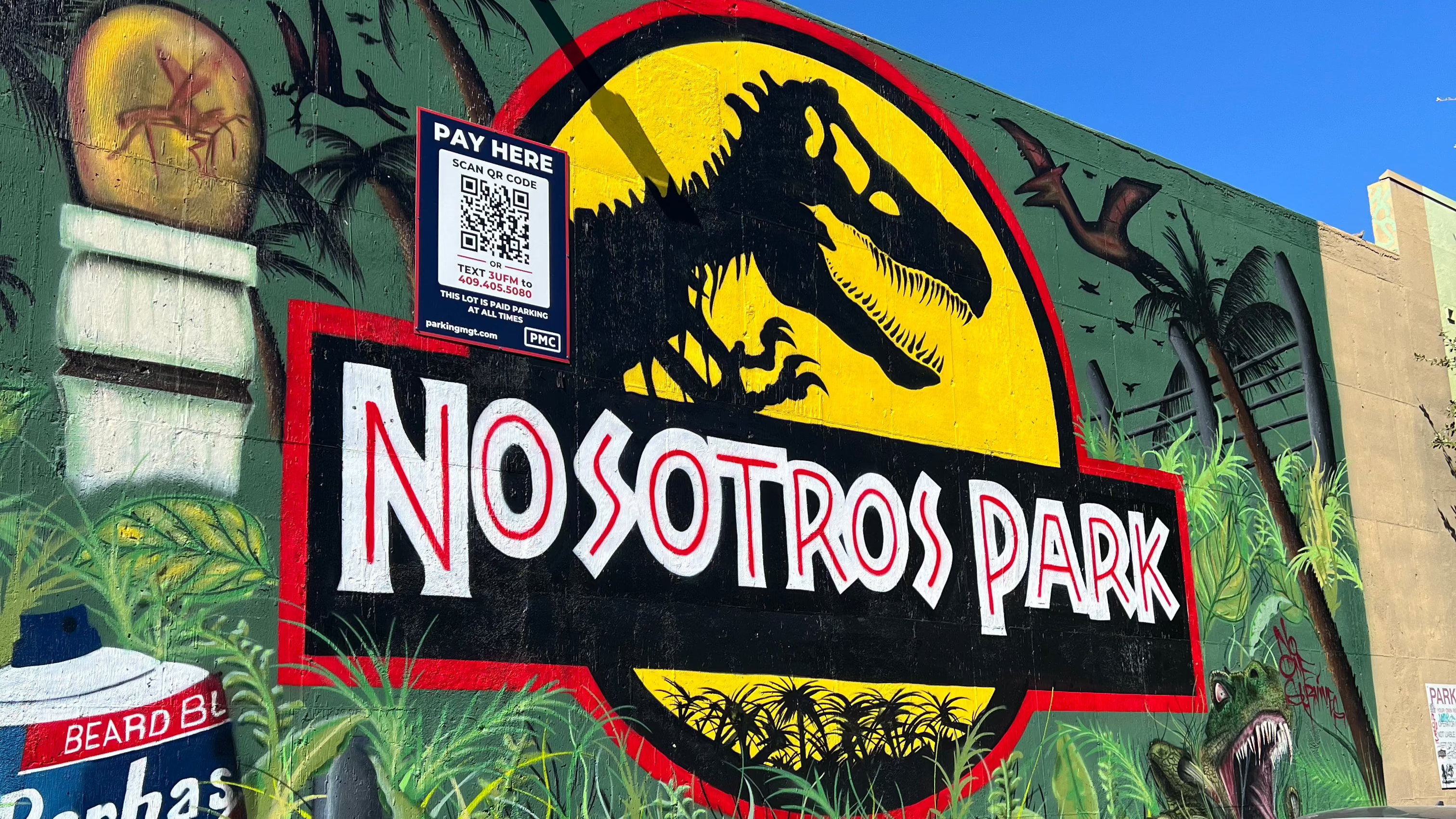 Jurassic Park style logo with "Nosotros Park" - a mural in downtown Tucson